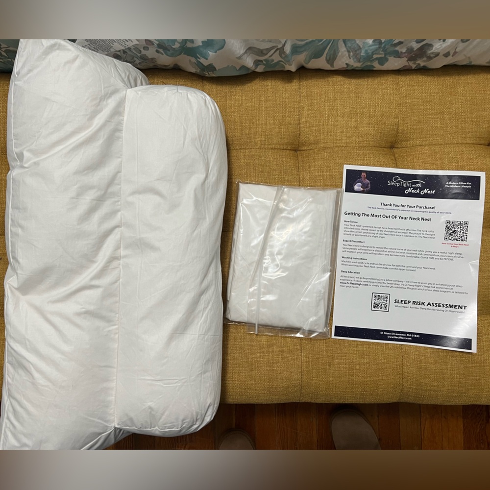 Brand new Neck Nest pillow with brand new cover never been used!